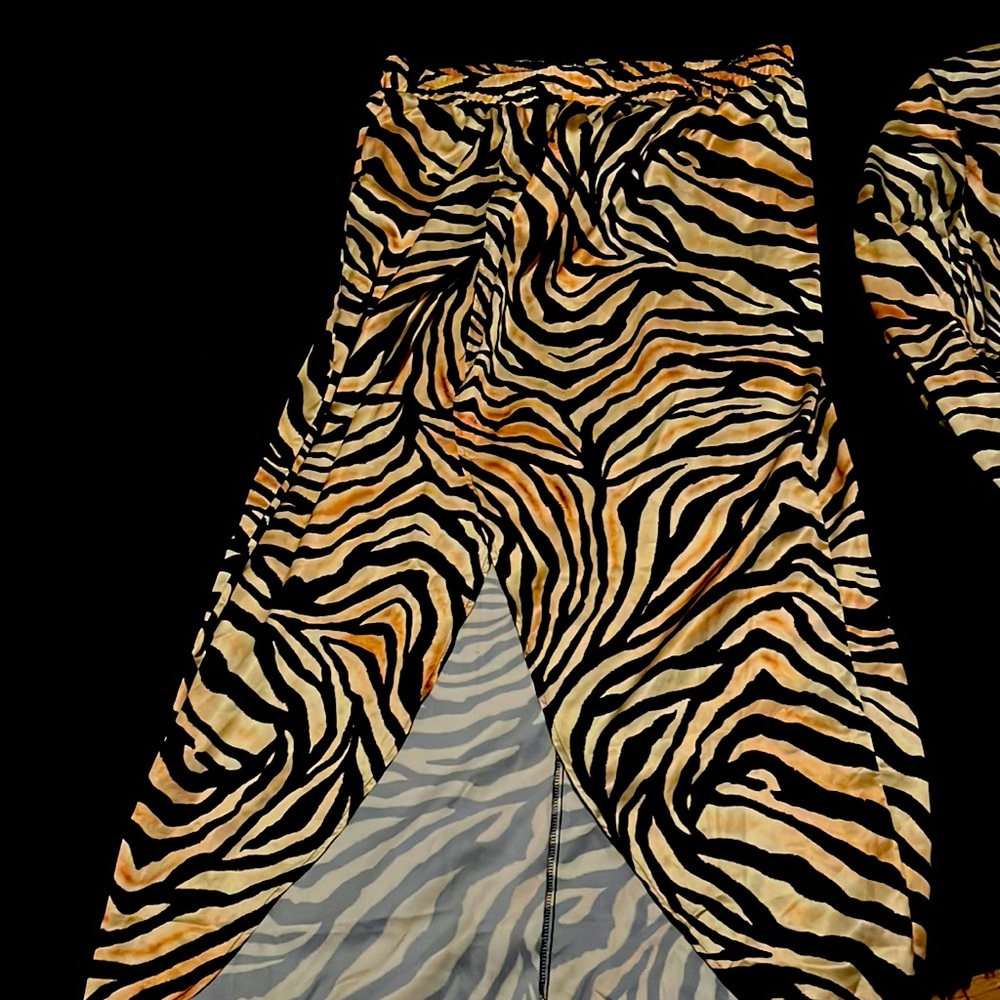 A SHEIN two piece half top and a high low skirt polyester blend material